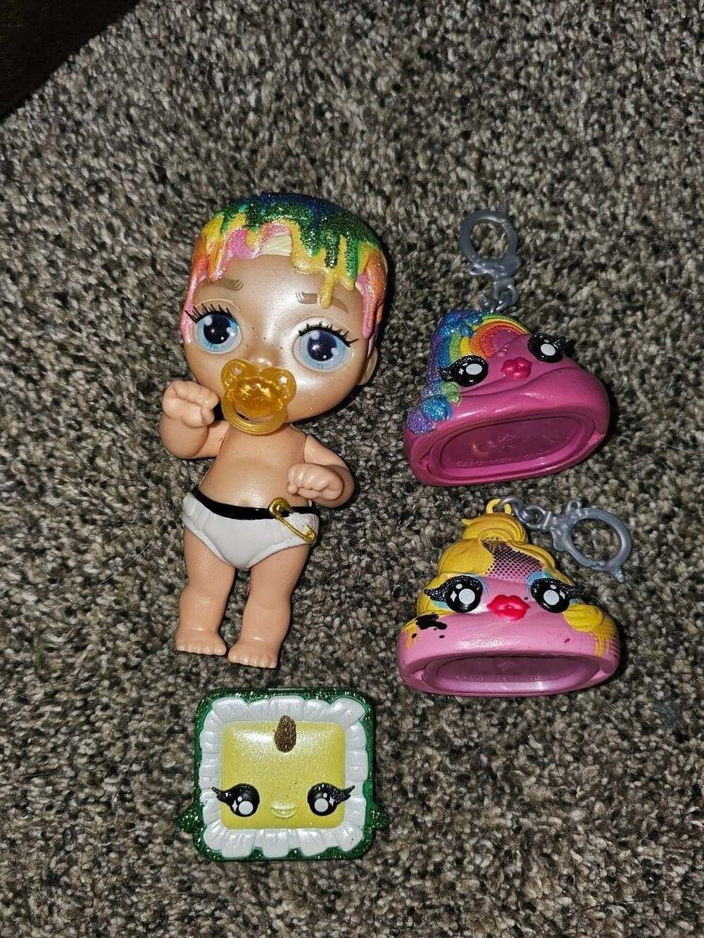 Poopsie Rainbow Surprise Fantasy Friends Kai Chroma Doll and three Slime Suprise